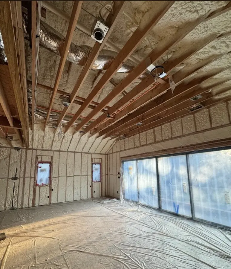 Interior walls and ceiling insulated with spray foam during new construction in Bloomfield